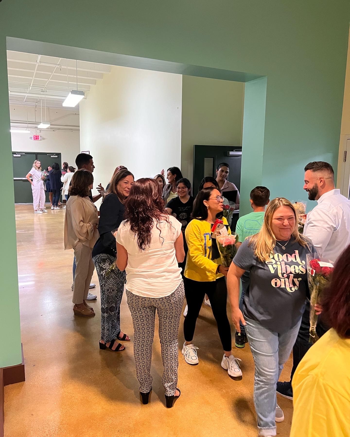 National Grassroot Flower Movement spreads to Miami by surprising teachers at Doral Academy Elementary with appreciative flower bouquets before the start of the school year